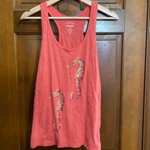 Beautiful coral tank with seahorse design.